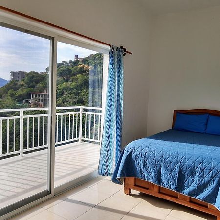 Aparthotel Sunset House Zihuatanejo Pokoj fotografie